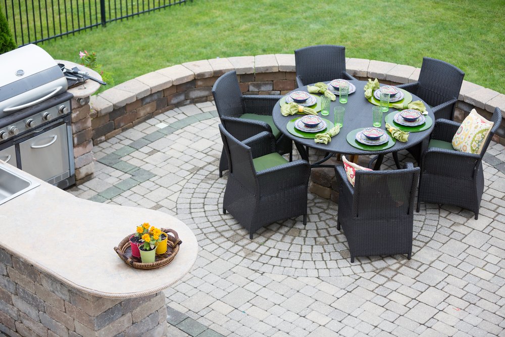 outdoor kitchen and paver patio
